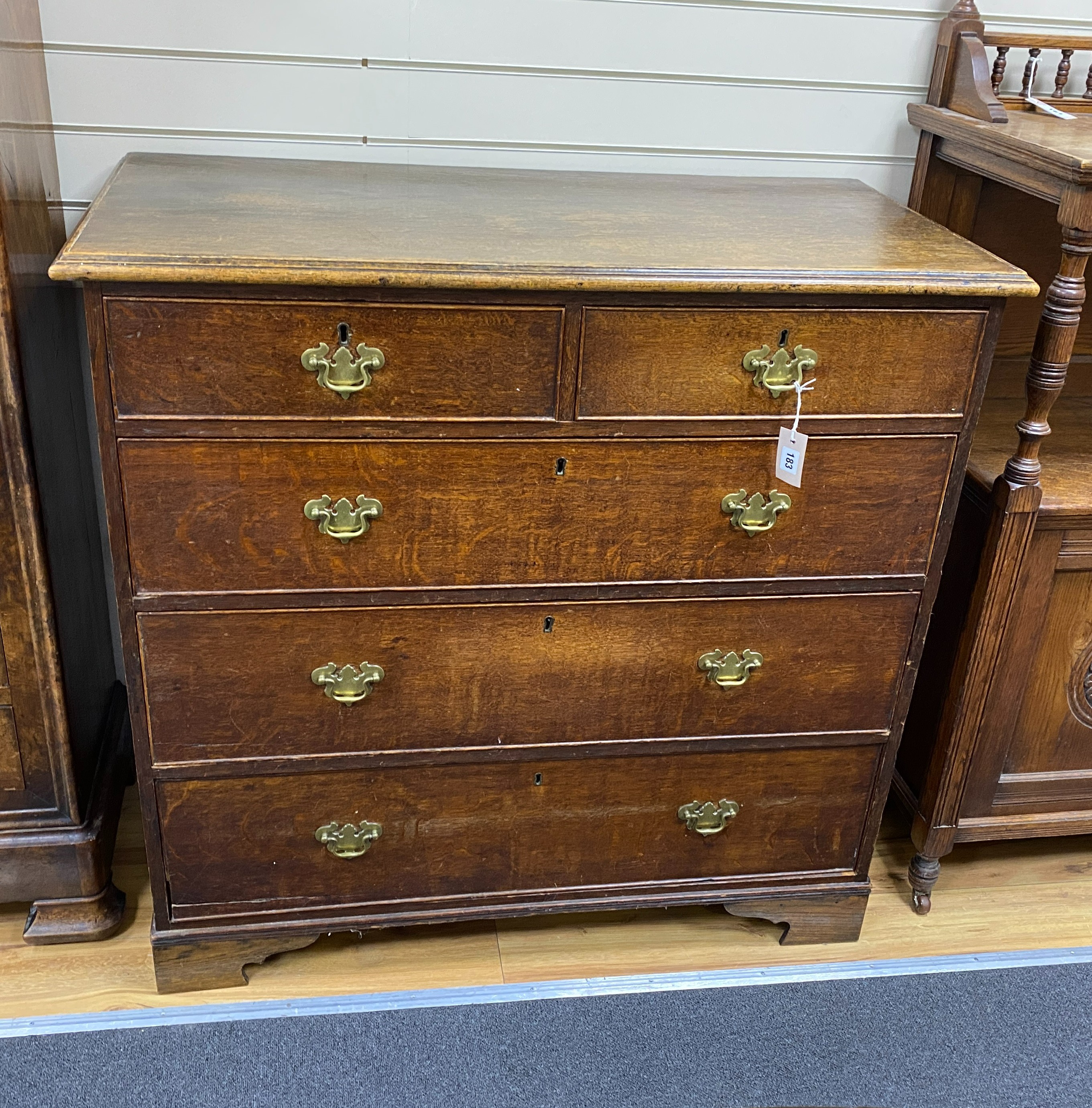 A George III provincial oak chest, width 106cm, depth 53cm, height 102cm.
